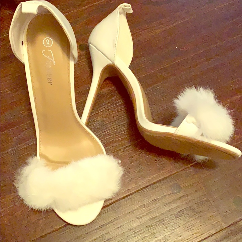 White heels with fur.